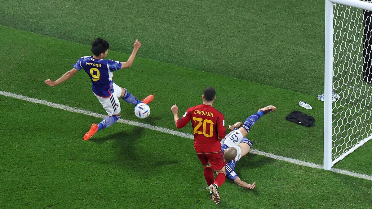BLURRED LINES: Japan's Kaoru Mitoma crucially keeps the ball in against Spain. Picture: GIUSEPPE CACACE/AFP via Getty Images