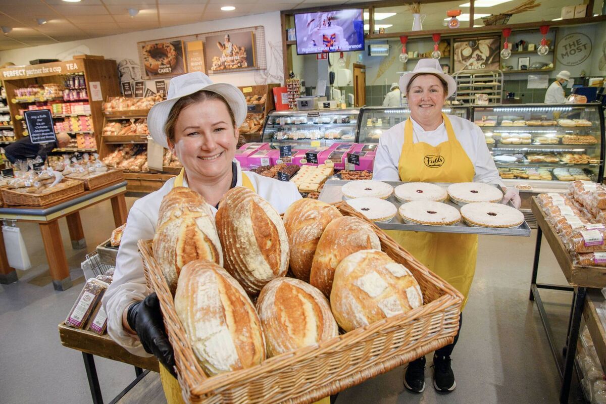 Oven-fresh breads and baked goods are part of the supermarket’s daily fare/ Picture at the cake counter is Celine Surowiecka and Eilish White. 