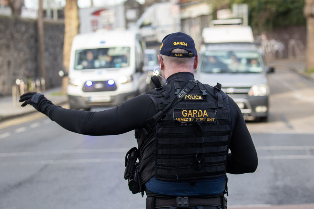 A member of the Garda Armed Support Unit helps to manage traffic outside the Special Criminal Court where the trial of Gerry Hutch, for the murder of David Byrne, is continuing. Picture: Collins Courts