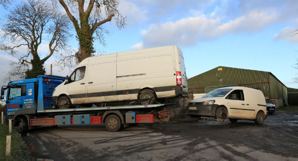 Gardaí remove two vans from an industrial storage unit at Muckerstown near Ashbourne, Co Meath, where €5m worth of cocaine and cannabis was discovered. Picture: Colin Keegan