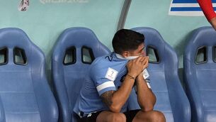 <p>TEARFUL: Uruguay's Luis Suarez sits on the bench during the World Cup Group H game against Ghana at the Al Janoub Stadium in Al Wakrah, Qatar. Pic: AP PhotoThemba Hadebe</p>