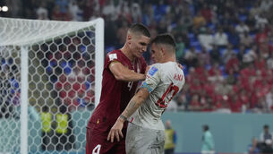 <p>FIERY: Serbia's Nikola Milenkovic, left, pushes Switzerland's Granit Xhaka. Pic: AP Photo/Ricardo Mazalan</p>