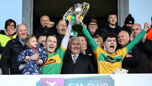 <p>JOY, AT LAST: Dunloy’s Paul Shields and Ryan Elliott lift the cup.</p>