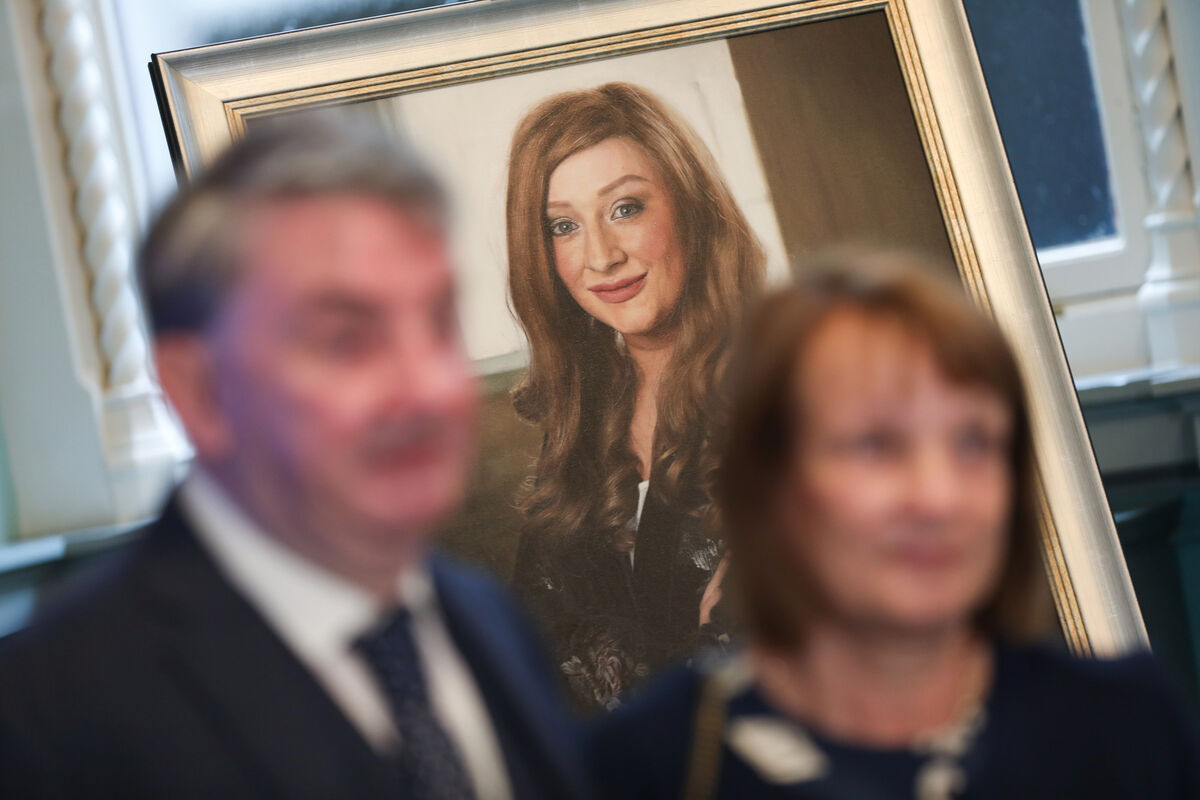 Larry and Bernie stand in front of a portrait of their late daughter Laura Brennan. RCPI commissioned this portrait to add the first health advocate, who is not a doctor, to its collection in acknowledgement of Laura’s outstanding contribution to boosting the take up of the HPV vaccine. Picture: Kenneth O Halloran