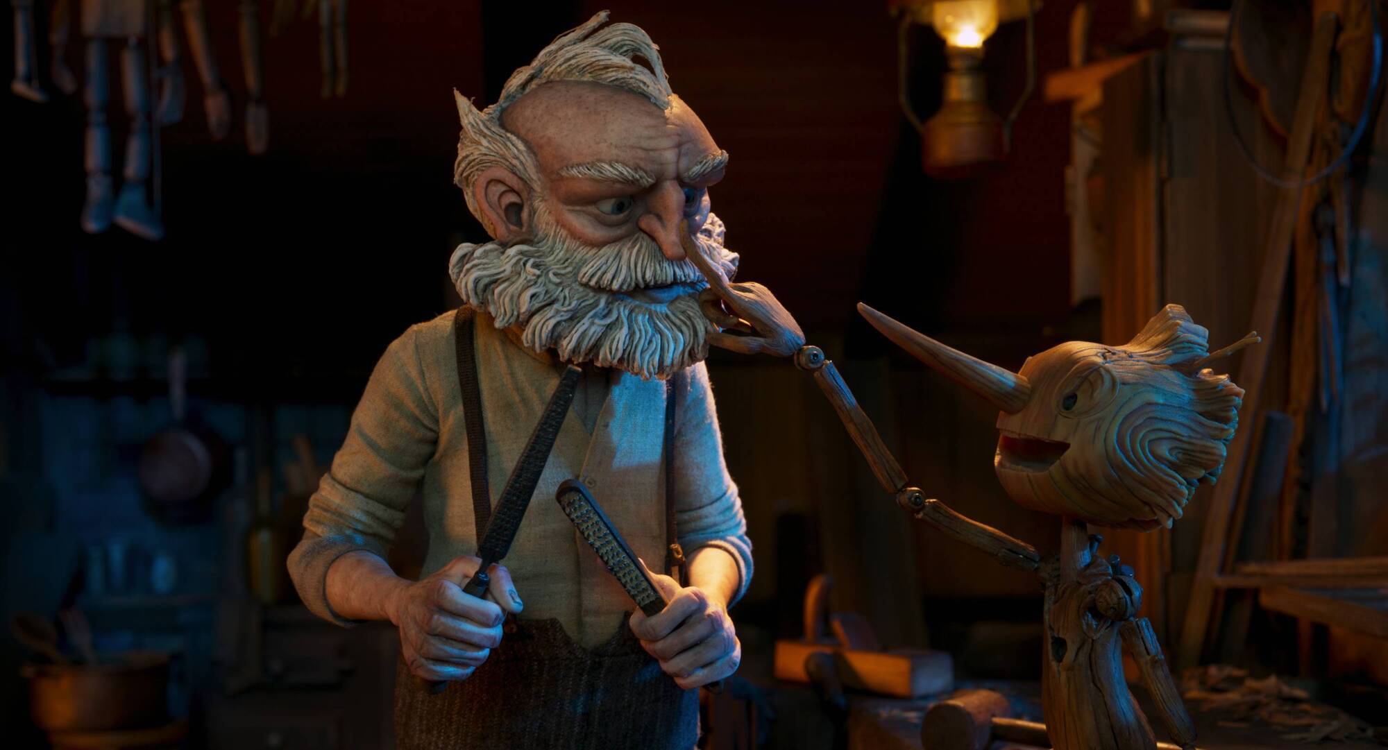 Guillermo del Toro's Pinocchio - (L-R) Gepetto (voiced by David Bradley) and Pinocchio (voiced by Gregory Mann). Picture: Netflix © 2022 