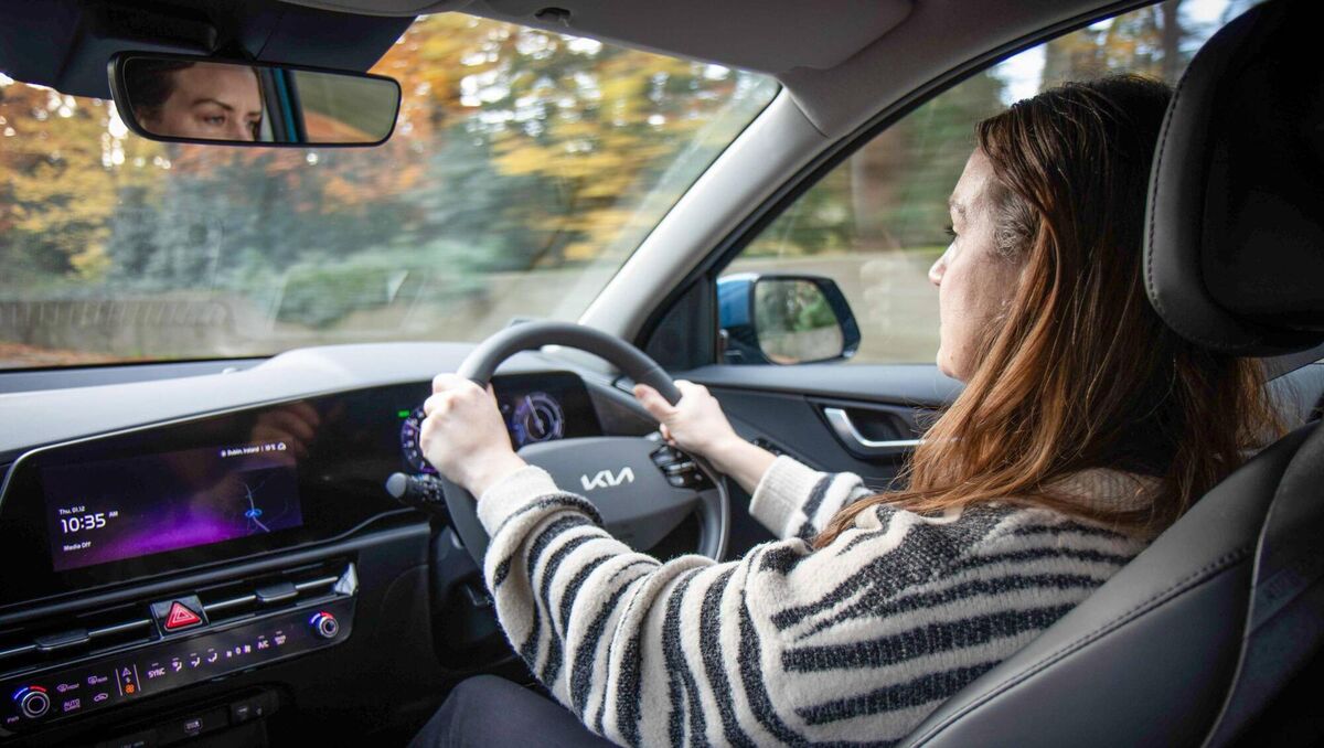 May behind the wheel of the Kia Niro EV. 