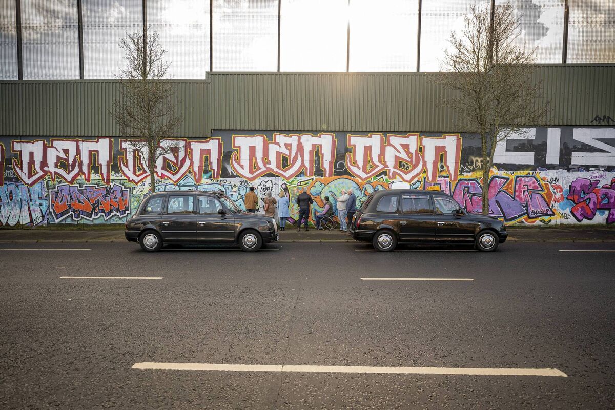Touring Around Belfast gives visitors an insight into Belfast the city, its history, its murals and its people while driving the city in a classic black cab