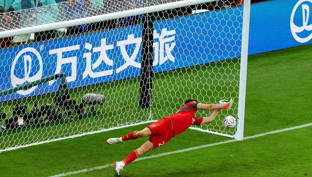 CRUCIAL: Argentina goalkeeper Emiliano Martinez saves a penalty from Netherlands' Steven Berghuis during the penalty shoot-out. Pic: Peter Byrne/PA Wire
