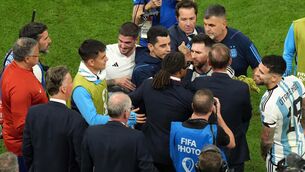<p>FIERY: Argentina's Lionel Messi and Netherlands coach Edgar Davids at the final whistle as Netherlands manager Louis van Gaal looks on during the FIFA World Cup Quarter-Final match at the Lusail Stadium in Lusail, Qatar. Pic: Peter Byrne/PA Wire</p>