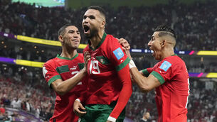 <p>WINNER: Morocco's Youssef En-Nesyri, center, celebrates after scoring his side's goal during the World Cup quarterfinal soccer match between Morocco and Portugal, at Al Thumama Stadium in Doha, Qatar. Pic: AP Photo/Martin Meissner</p>