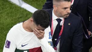 <p>TEARS: Cristiano Ronaldo leaves the field at the end of the World Cup quarter-final. Pic: Luca Bruno/AP</p>