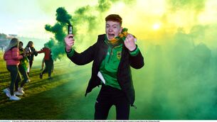 <p>DELIRIUM: A Glen supporter celebrates after the AIB Ulster GAA Football Senior Club Championship Final match between Glen Watty Graham's of Derry and Kilcoo of Down at the Athletics Grounds in Armagh. Pic: Ben McShane/Sportsfile</p>