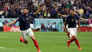<p>SOLDIERS: France's forward Olivier Giroud celebrates scoring his team's second goal with defender Raphael Varane during the Qatar 2022 World Cup quarter-final against England at the Al-Bayt Stadium in Al Khor, north of Doha. Pic: Adrian Dennis/AFP via Getty Images)</p>