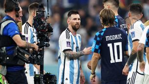 <p>DUAL: Lionel Messi of Argentina and Luka Modric of Croatia shake hands after the FIFA World Cup semi-final match at Lusail Stadium in Lusail City, Qatar. Pic: Richard Heathcote/Getty Images</p>