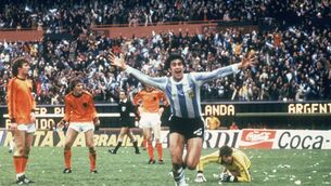 <p>ICONIC: Mario Kempes of Argentina celebrates scoring a goal during the 1978 World Cup final. Pic: Getty Images)</p>
