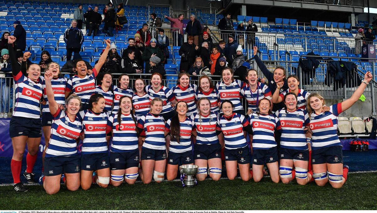Blackrock College players celebrate with the trophy after their side's victory in the Energia AIL Women's Division final. Picture: Seb Daly/Sportsfile