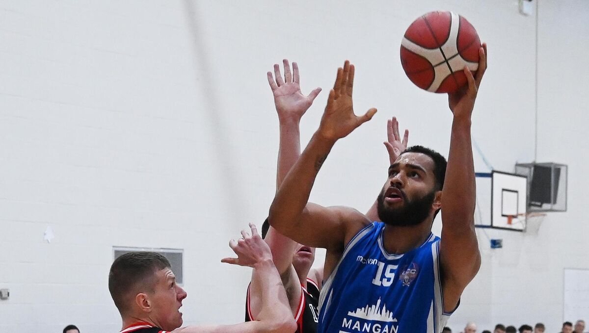 FRONT FOOT: UCC Demons' Kingsley Nwagboso shoots past Ballincollig's Ronan O'Sullivan on Saturday.