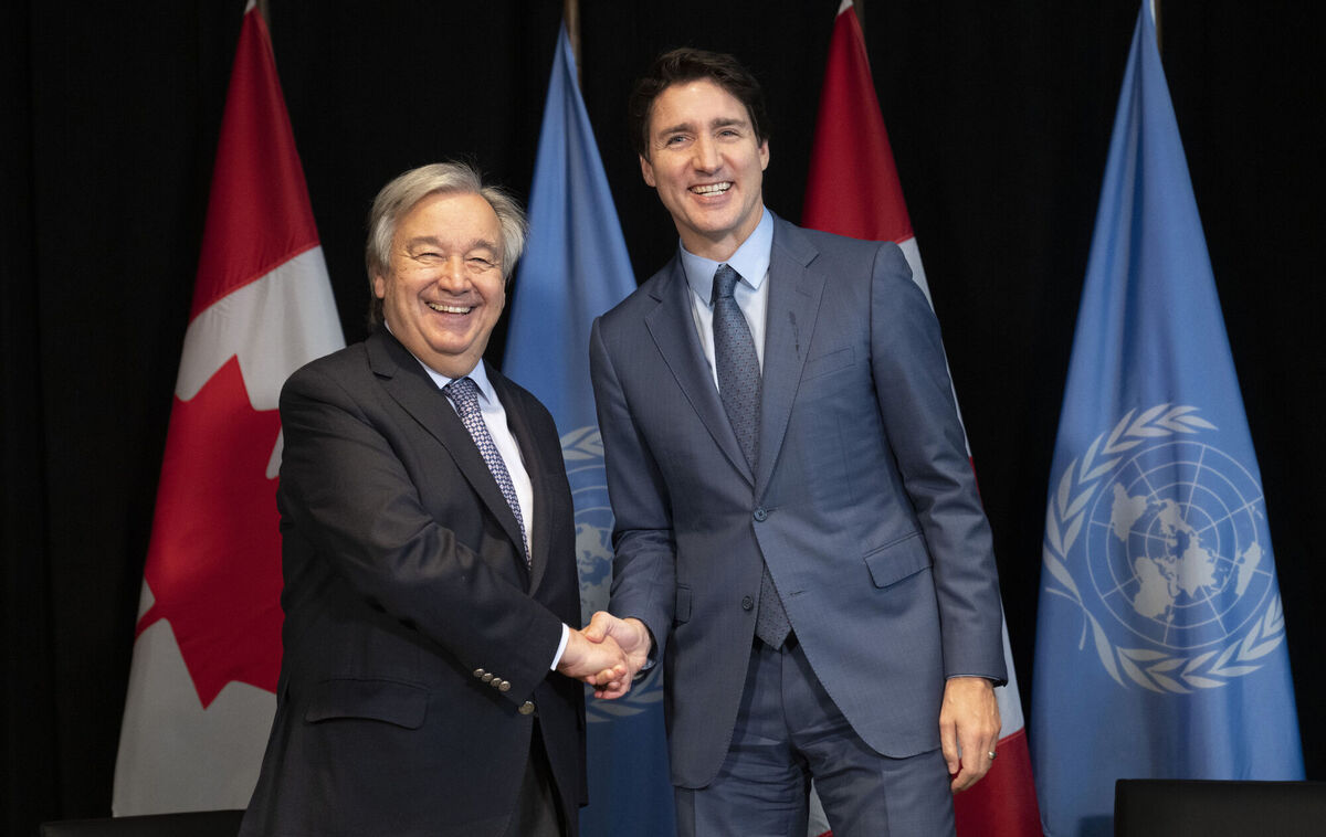Canadian Prime Minister Justin Trudeau, right, greets Secretary-General of the United Nations Antonio Guterres at a bilateral meeting in Montreal, on Wednesday, Dec. 7, 2022. (Paul Chiasson/The Canadian Press via AP)