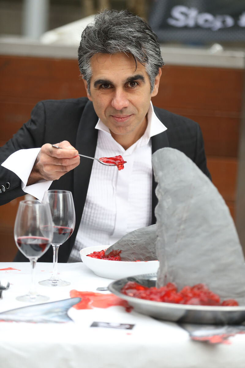 Manuel Salazar tucking in at a make-believe pop-up restaurant serving shark fins, on Grafton Street in Dublin in 2021 to call attention to the need to protect Ireland’s sharks and ocean ecosystem. Photo: Leah Farrell/RollingNews.ie Manuel Salazar tucking in at a make-believe pop-up restaurant serving shark fins, on Grafton Street in Dublin in 2021 to call attention to the need to protect Ireland’s sharks and ocean ecosystem. Photo: Leah Farrell/RollingNews.ie