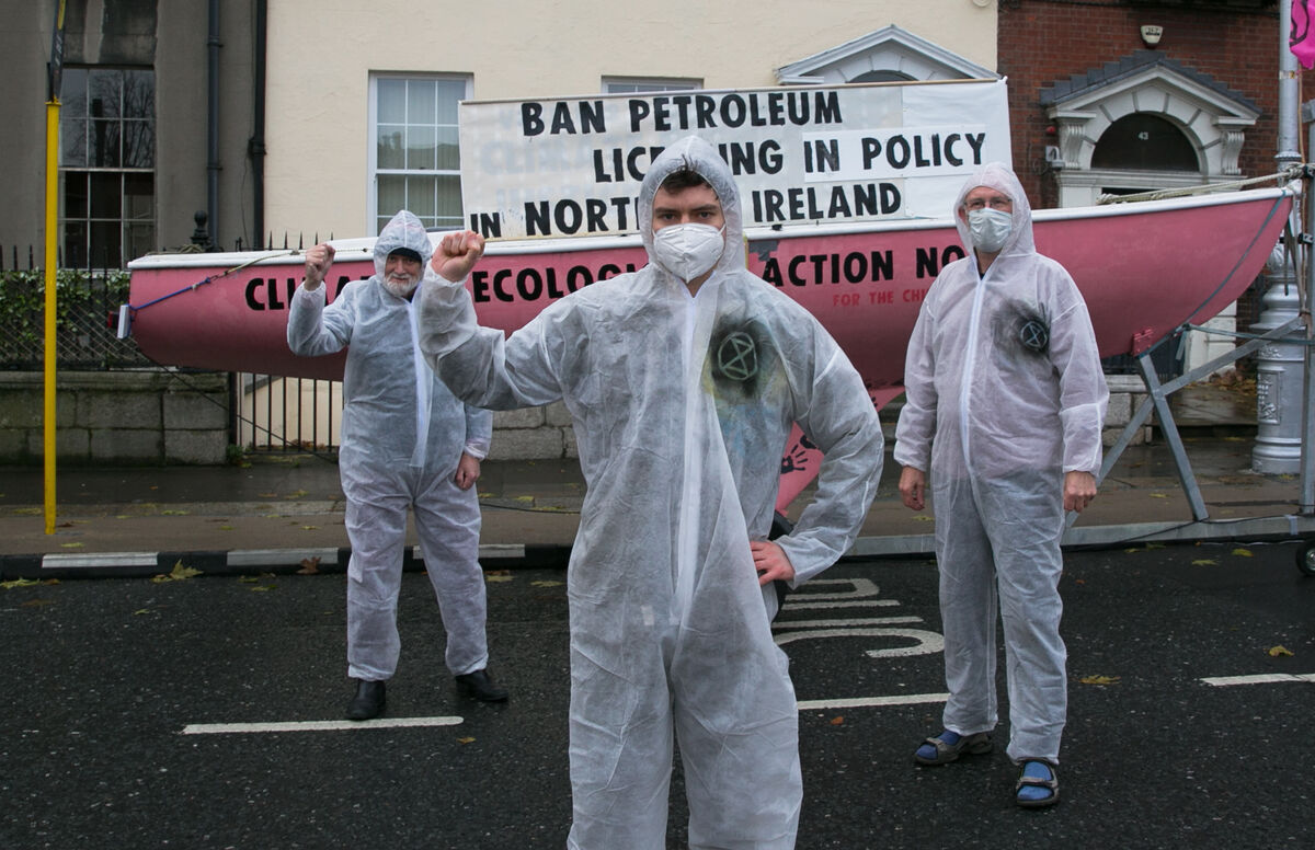 (Left to right) Art O Laoghaire from Bray, Oscar Mooney from Sandymount and Louis Heath from Sandyford during an Extinction Rebellion protest outside a Sinn Fein party office in Dublin to tell the party to act in the Stormont Executive to ensure a full and final ban on petroleum licensing. Photo: Gareth Chaney/Collins (Left to right) Art O Laoghaire from Bray, Oscar Mooney from Sandymount and Louis Heath from Sandyford during an Extinction Rebellion protest outside a Sinn Fein party office in Dublin to tell the party to act in the Stormont Executive to ensure a full and final ban on petroleum licensing. Photo: Gareth Chaney/Collins