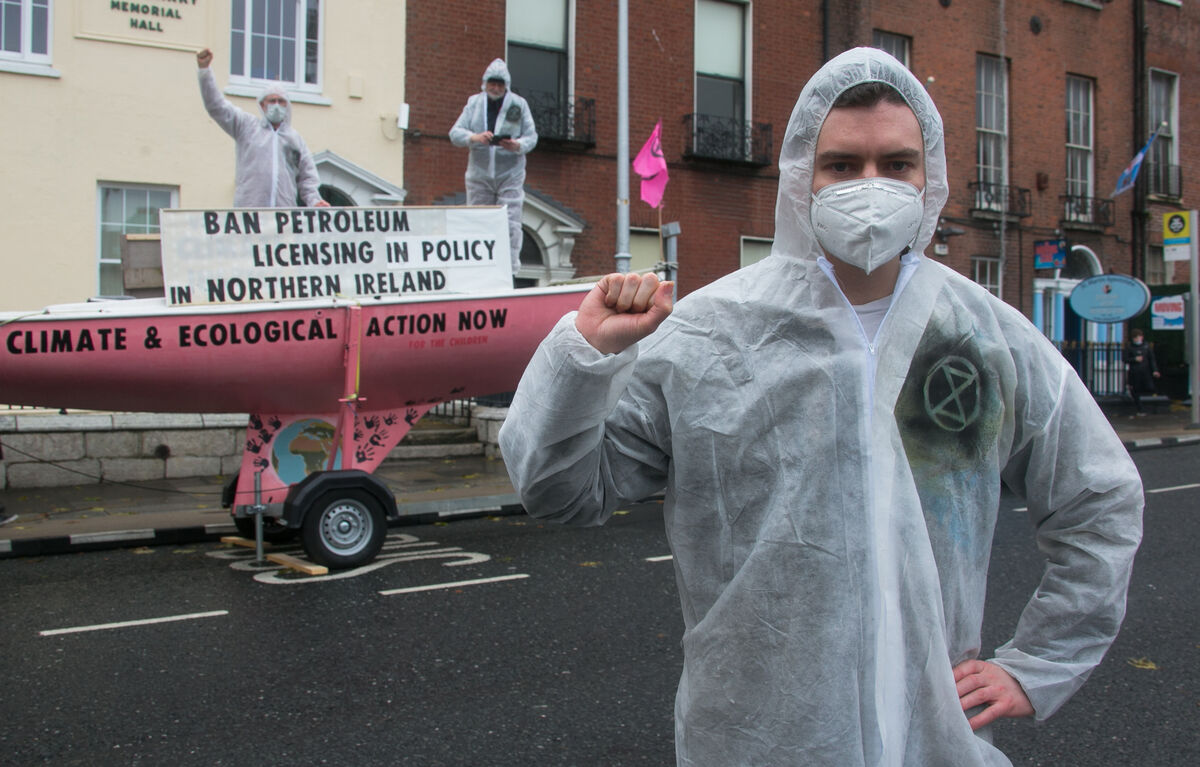 (Left to right) Louis Heath from Sandyford, Oscar Mooney from Sandymount and Art O Laoghaire from Bray at an Extinction Rebellion protest. "What we need is people to march with us on the streets." Photo: Gareth Chaney/Collins (Left to right) Louis Heath from Sandyford, Oscar Mooney from Sandymount and Art O Laoghaire from Bray at an Extinction Rebellion protest. "What we need is people to march with us on the streets." Photo: Gareth Chaney/Collins
