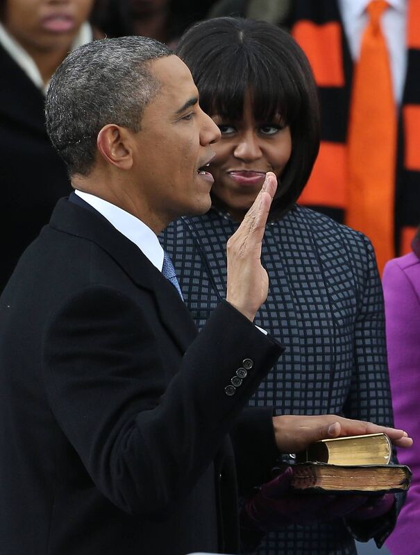 US President Barack Obama is sworn in as First lady Michelle Obama looks on during the public ceremonial inauguration on the West Front of the US Capitol January 21, 2013 in Washington, DC. Picture: Justin Sullivan/Getty Images