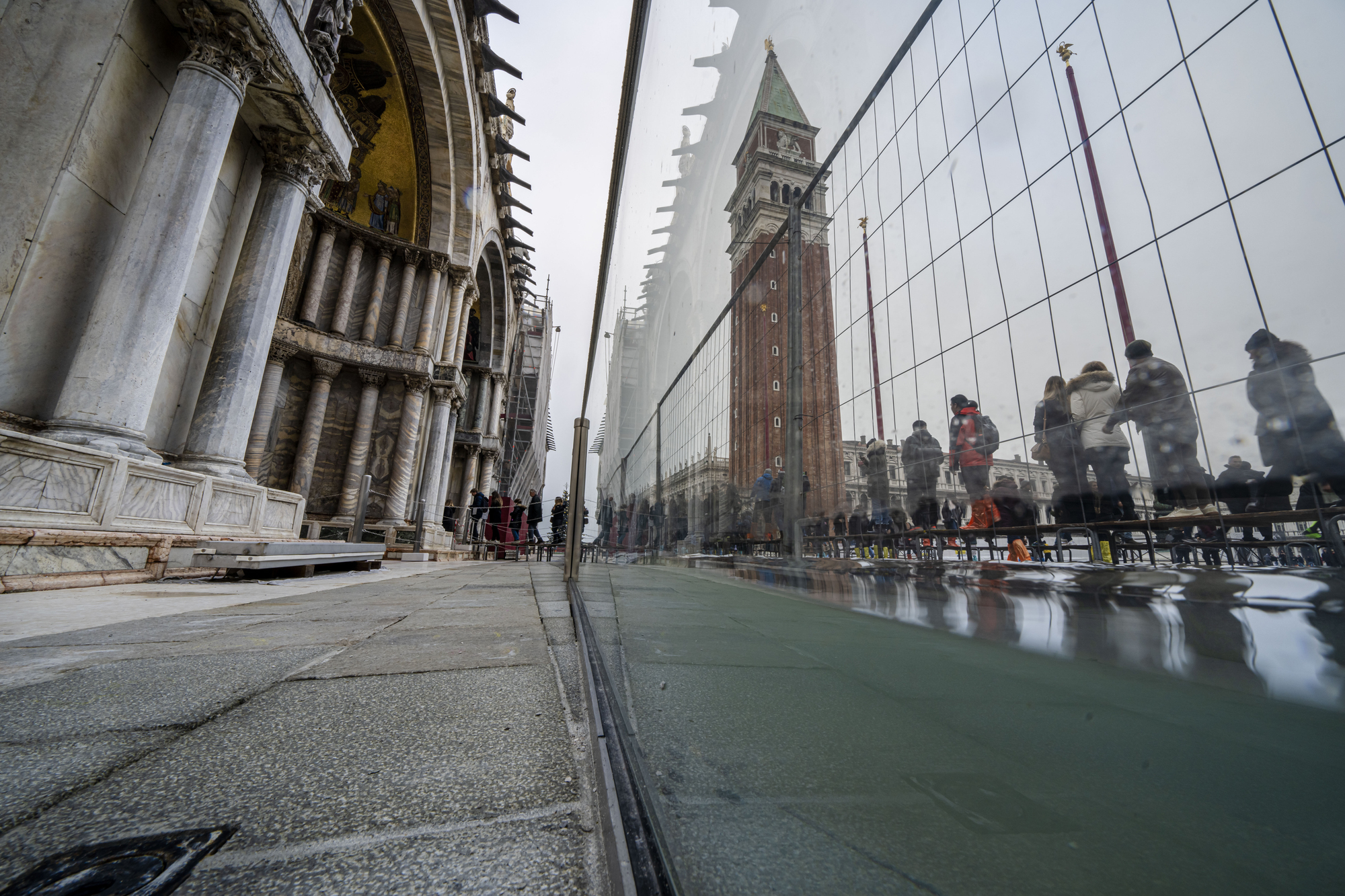 Glass barriers help protect Venice’s famous basilica from high tides
