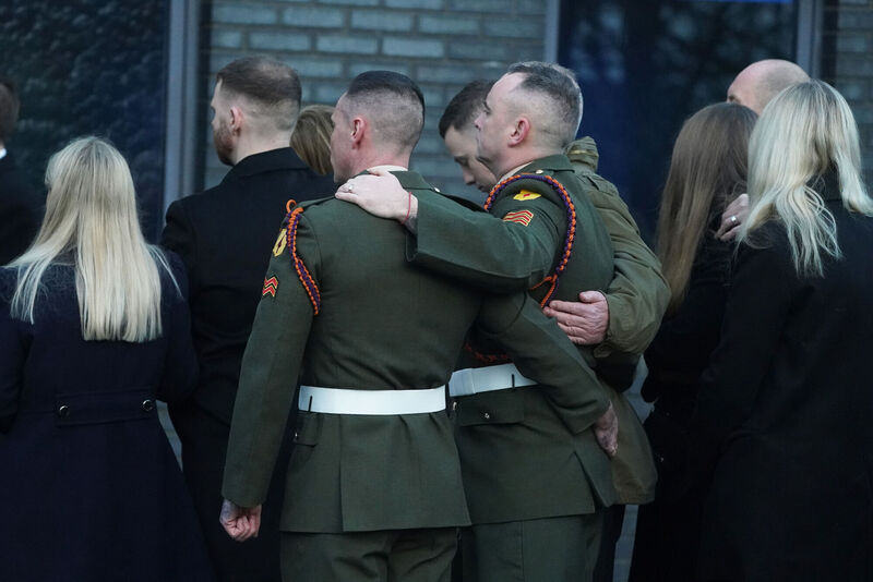Mourners arrive for the funeral mass for Private Sean Rooney at Holy Family Church, Dundalk, Co Louth. Picture: Brian Lawless/PA Wire