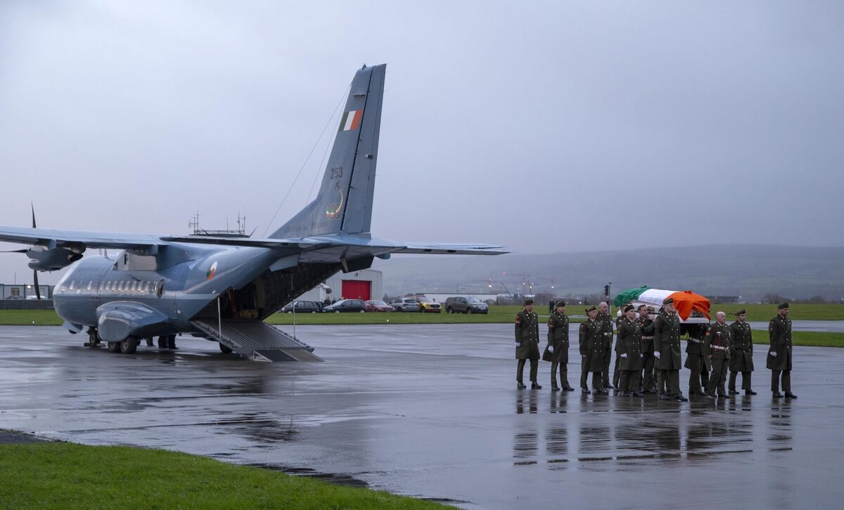 The remains of Pte Sean Rooney are taken off the Air Corps CASA aircraft at Casement Aerodrome, Baldonnel. Picture Colin Keegan/ Collins
