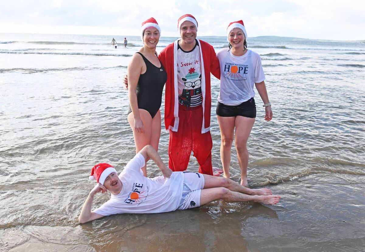 Alan Hetherington,Orna Connolly, Andy Goulding and Nora Conway at the 14th annual Hope Splash Christmas swim in aid of the Hope Foundation at Garrettstown beach earlier this month. Picture; Eddie O'Hare