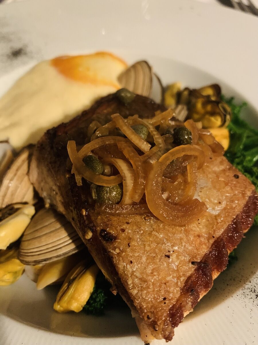 Salmon, Hollandaise sauce, garden kale, mussels, clams, red pepper, leek ash Salmon, Hollandaise sauce, garden kale, mussels, clams, red pepper, leek ash