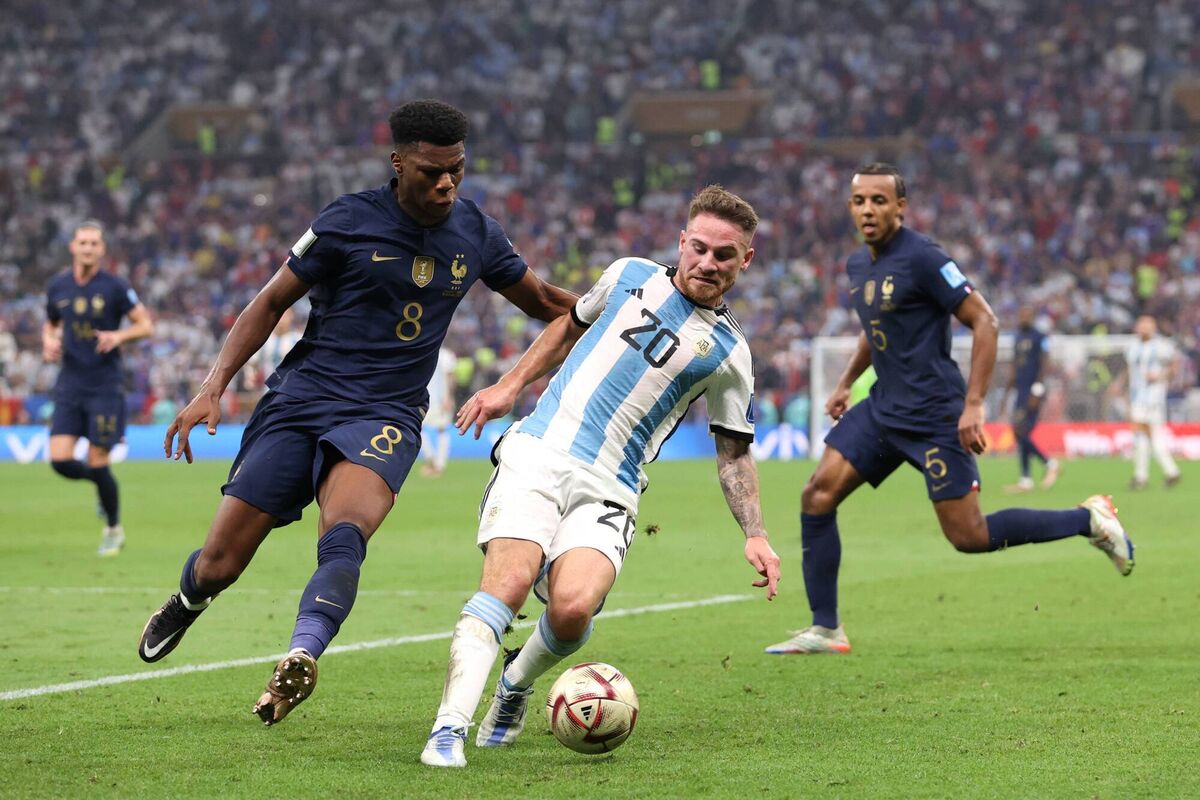 BRIGHTON ROCK; Mac Allister shields the ball from France's Aurelien Tchouameni in the final. BRIGHTON ROCK; Mac Allister shields the ball from France's Aurelien Tchouameni in the final.