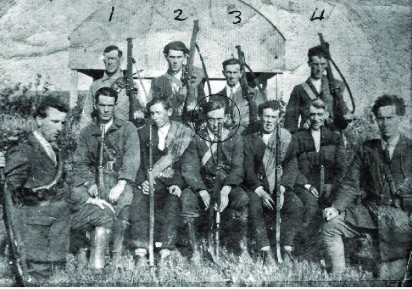 Kilflynn IRA Flying Column, 1922. Back (L to R): Denis O'Connell (Lixnaw), Stephen Fuller (Kilflynn), William Hartnett (Mountcoal), Tim Twomey (Kilflynn). Front (L to R): Terry Brosnan (Lixnaw), John McElligott (Leam, Kilflynn), Danny O'Shea (Kilflynn), Timothy (Aero) Lyons (Garrynagore), Tim Sheehy (Lyre), Pete Sullivan (Ballyduff), Paddy Mahony (Ballyegan, Battalion O.C.).
