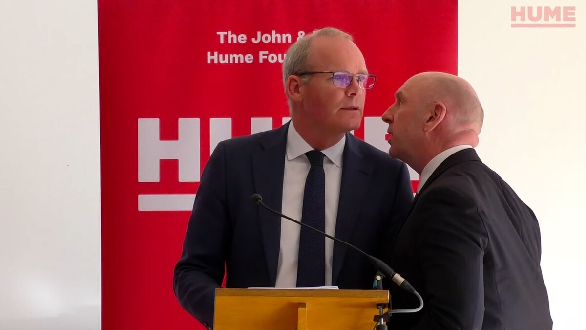 Simon Coveney was ushered from the room due to a security alert whilst he was speaking at a peacebuilding event organised by the John and Pat Hume Foundation.