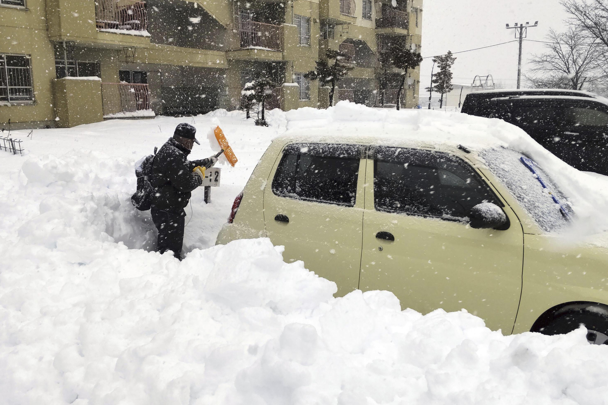 Heavy snow in Japan leaves at least 17 people dead and dozens injured
