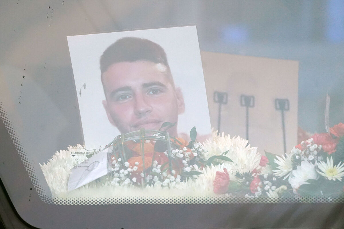 A photograph of Private Sean Rooney outside Holy Family Church, Dundalk, Co Louth ahead of his funeral mass last week. Picture: Brian Lawless/PA Wire