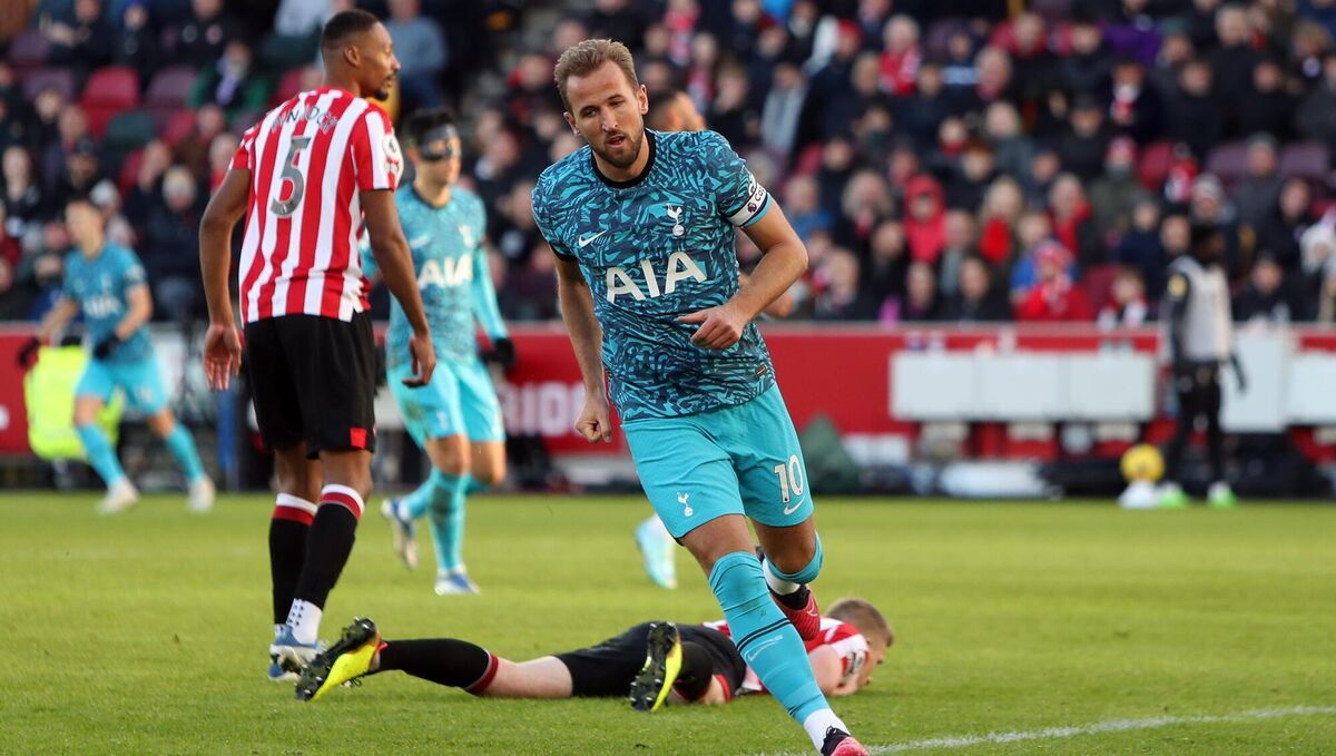 Tottenham Hotspur's Harry Kane celebrates scoring his sides first goal during the Premier League match at the Gtech Community Stadium.