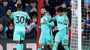 Adam Lallana, second right, reluctantly celebrates the first goal (Adam Davy/PA)