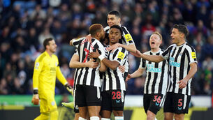 <p>MOMENTUM: Newcastle United's Chris Wood celebrates scoring the opening goal with team mates during the Premier League match at the King Power Stadium.</p>