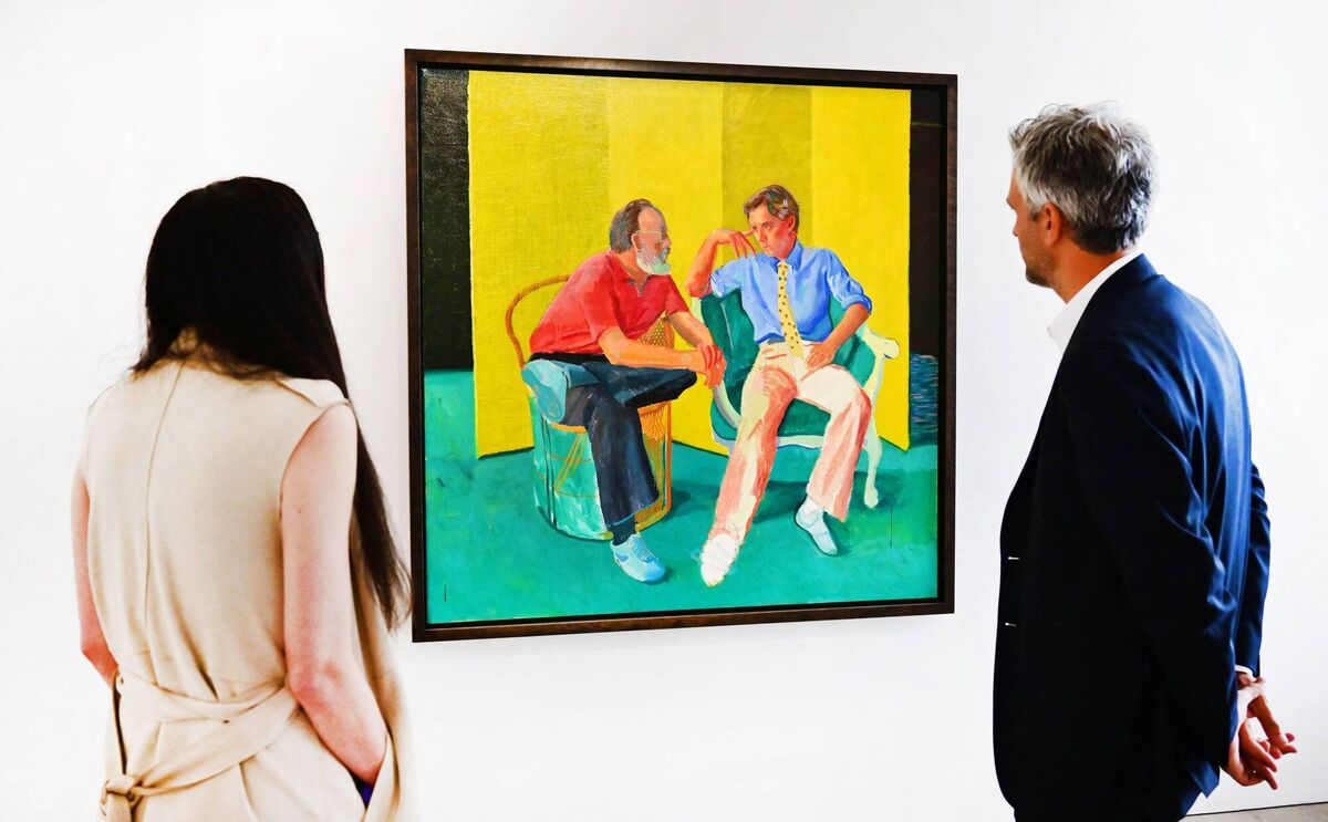 Christies staff view 'The Conversation' by David Hockney, part of the Paul Allen collection. Christies staff view 'The Conversation' by David Hockney, part of the Paul Allen collection.