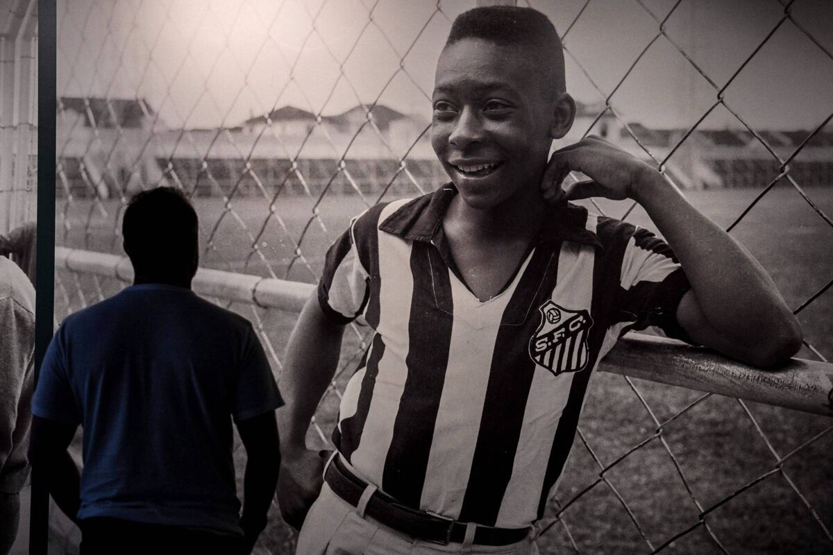 A visitor looks at a picture of Brazil's football legend Edson Arantes do Nascimento 'Pele', exhibited at the Pele Museum, in Santos, Brazil. Picture: NELSON ALMEIDA / AFP) 