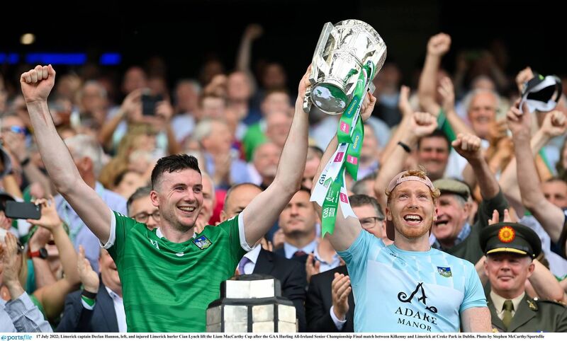  Limerick captain Declan Hannon, left, and injured Limerick hurler Cian Lynch lift the Liam MacCarthy Cup. Picture: Stephen McCarthy/Sportsfile