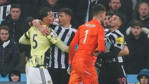 <p>RAIN AND RAGE: Tempers flare between players during the Premier League match at St. James' Park, Newcastle upon Tyne. Pic: Owen Humphreys/PA Wire.</p>