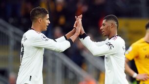 <p>HAPPY CLAPPERS: Manchester United's Raphael Varane and Marcus Rashford celebrate victory after the Premier League match at Molineux Stadium, Wolverhampton. Pic: David Davies/PA Wire.</p>