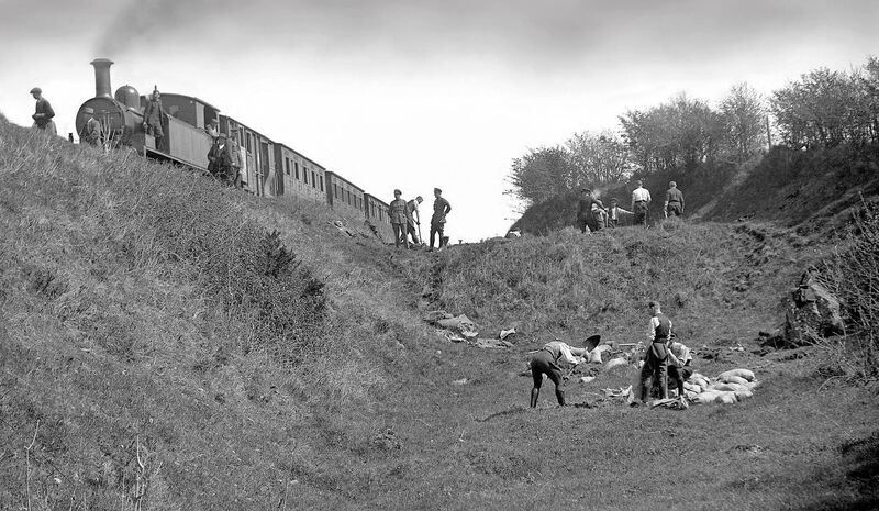 Free State troops and railway workers recover mail following a raid by republicans on a train on the Cork-Muskerry line in August 1922. Irish Examiner Archive