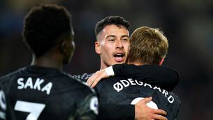 <p>TERRIFIC TRIO: Arsenal's Gabriel Martinelli (centre) celebrates with team-mate Martin Odegaard and Bukayo Saka after scoring their side's fourth goal of the game during the Premier League match at the American Express Community Stadium, Brighton. Pic: Adam Davy/PA Wire.</p>