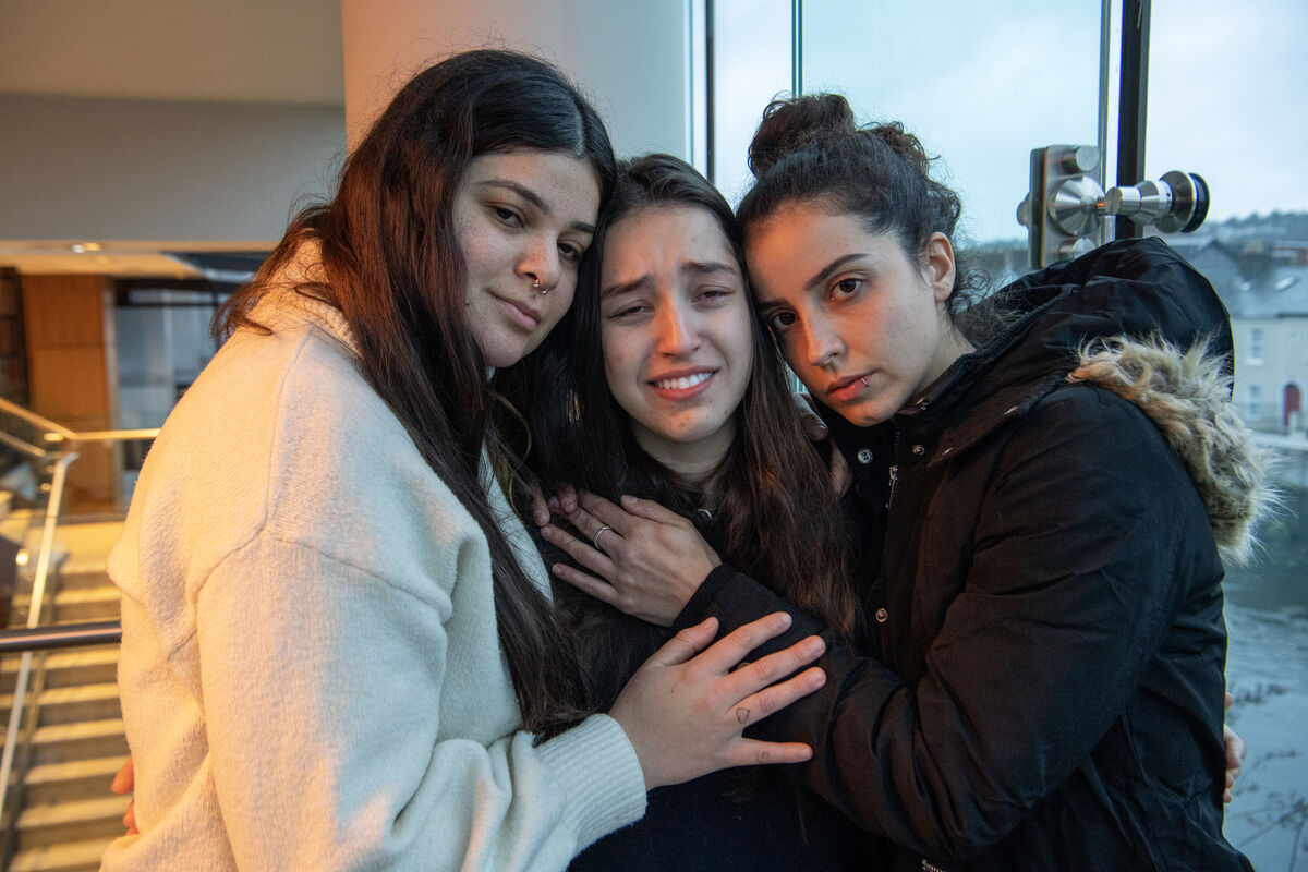 Bruna Fonseca's friend, Julina Souza, niece Maria Fonseca, and cousin Marcela Fonseca comfort each other while speaking about their grief at the loss of Bruna. Picture: Dan Linehan Bruna Fonseca's friend, Julina Souza, niece Maria Fonseca, and cousin Marcela Fonseca comfort each other while speaking about their grief at the loss of Bruna. Picture: Dan Linehan
