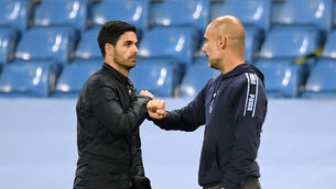 <p>TITLE RACE: Arsenal manager Mikel Arteta (left) and Manchester City manager Pep Guardiola fist bump after the Premier League match at the Etihad Stadium.</p>