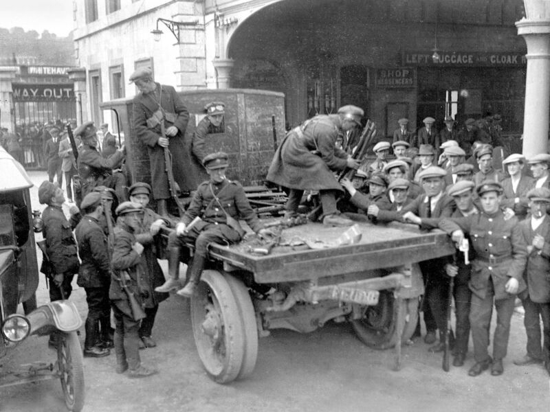 Free State soldiers unload guns at Albert St train station, Cork, shortly after fighting their way through Rochestown and Douglas, having landed at Passage West. Picture: Irish Examiner Archive 