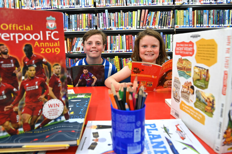 Tadhg and Cliodhna Rose McMahon in the children's library at Cork City Library. Picture: Dan Linehan